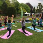 people doing yoga in a circle in weymouth