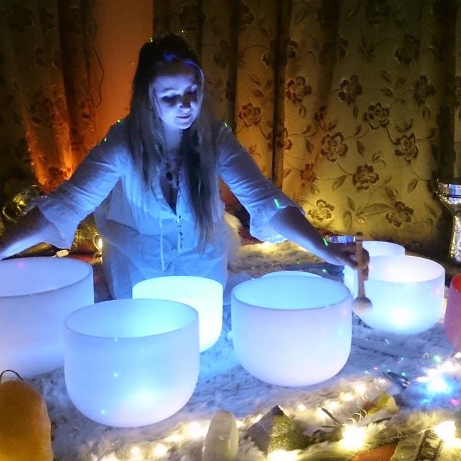 Bex Leonard playing her crystal bowls