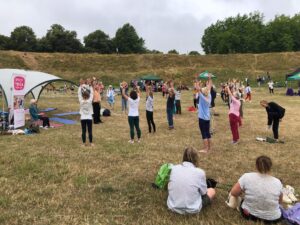 People doing yoga in a roman fort in Dorchester England